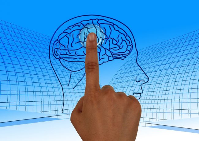 Index finger pointing at a cartoon brain