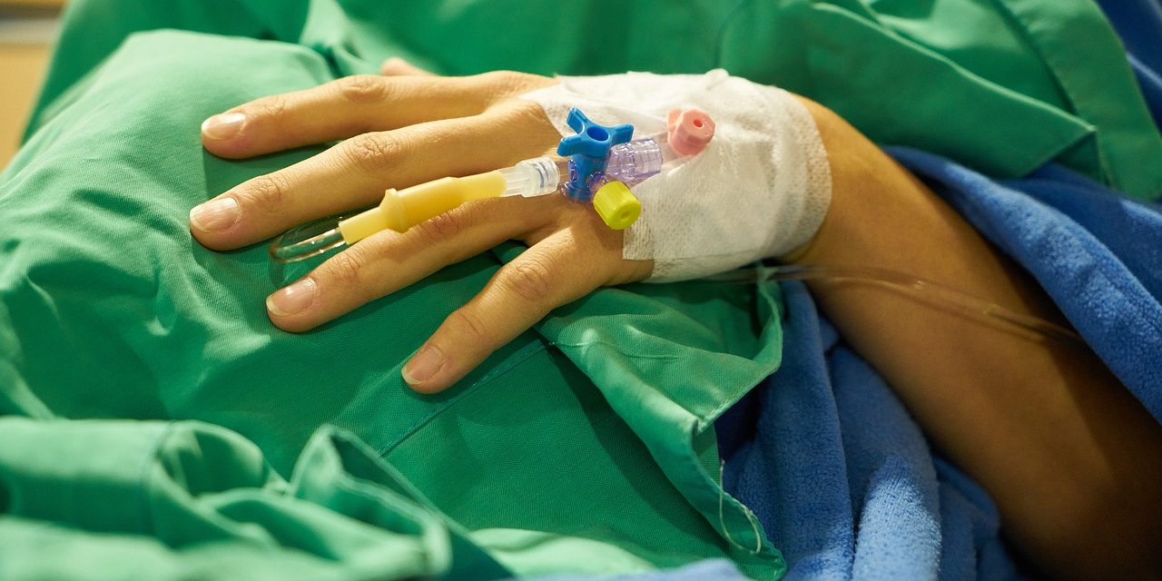 Hand of a person getting surgery
