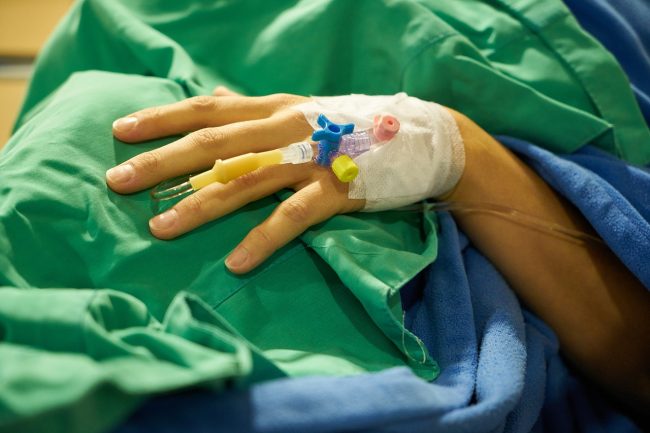Hand of a person getting surgery