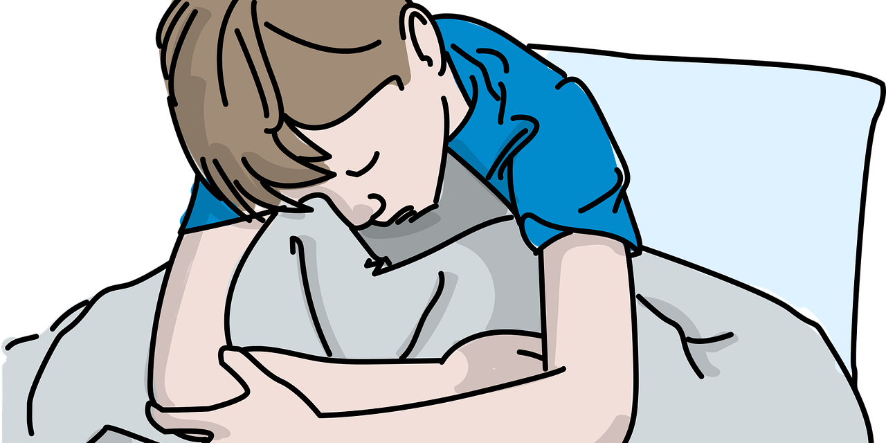 Cartoon of a boy in bed