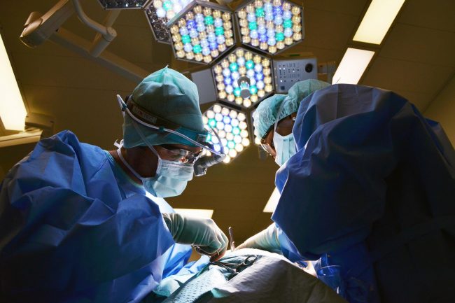 Surgeons perform operation